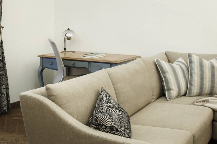 Classic sofa in beige-classic work desk-classic style interior Vienna